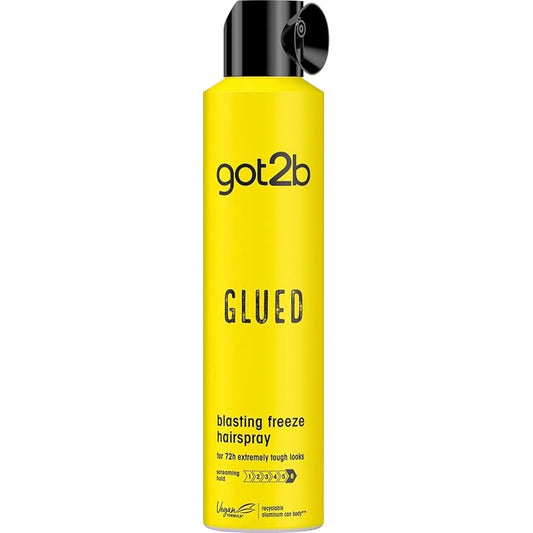 Yellow bottle of got2b Glued blasting freeze hairspray on a white background